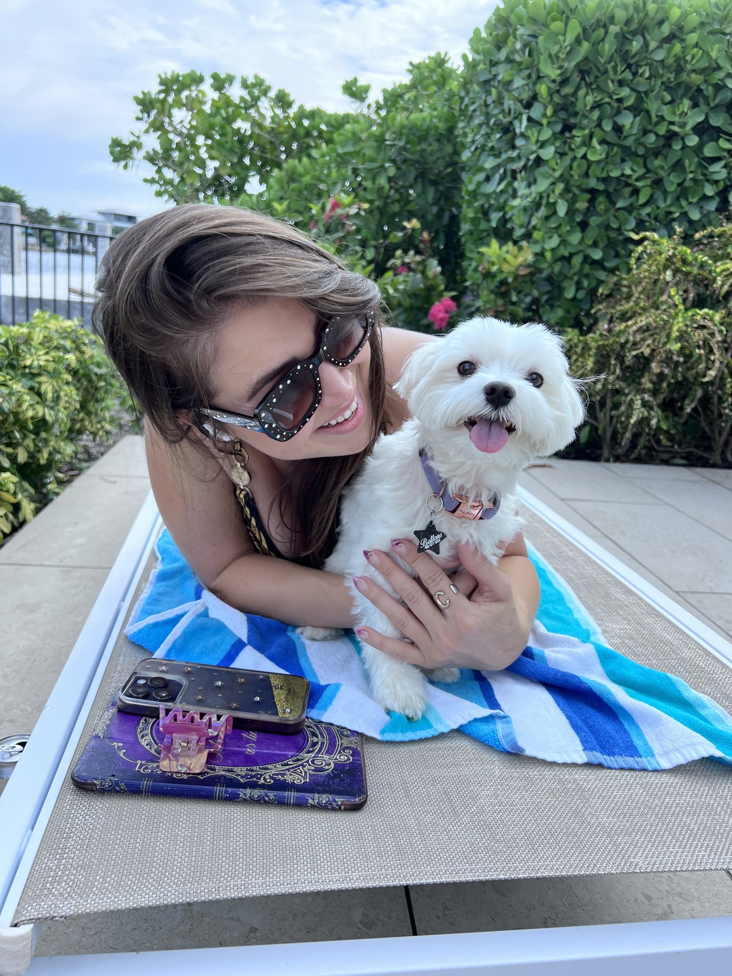 Me outdoors with my small white dog